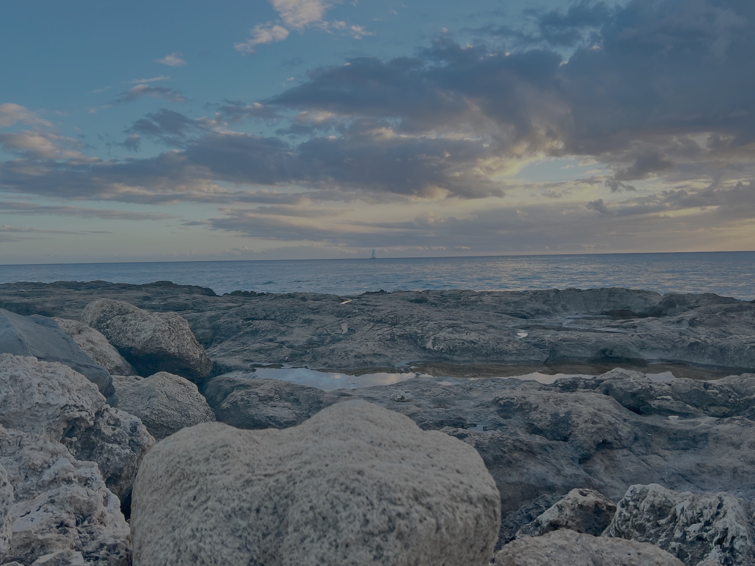 Rocky Hawaiian shoreline at dusk